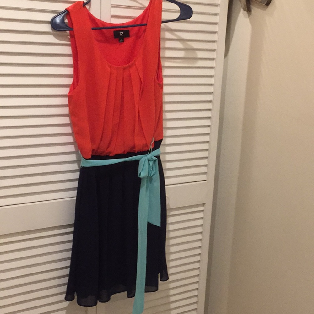 Women’s orange, navy and light blue dress